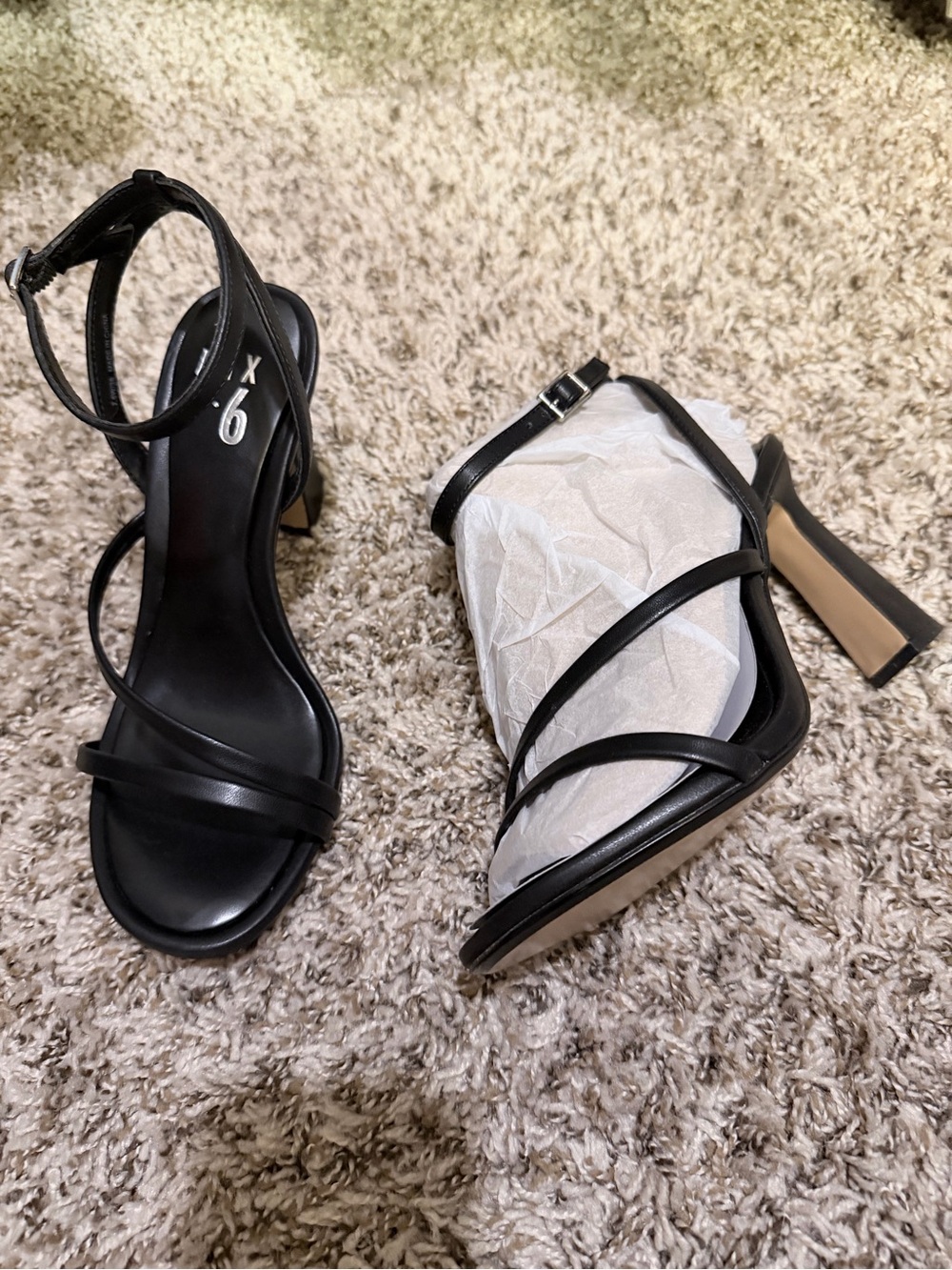 Strappy black heels